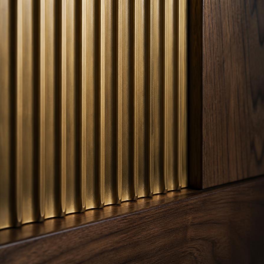 Detail of fluted bronze and walnut panel